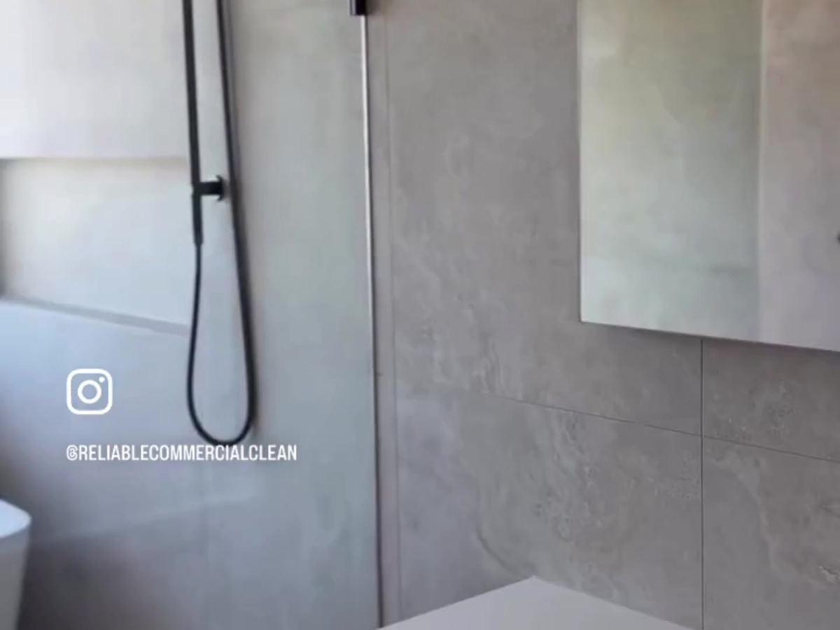 Freshly cleaned shower and tiles in a new build bathroom on the Sunshine Coast